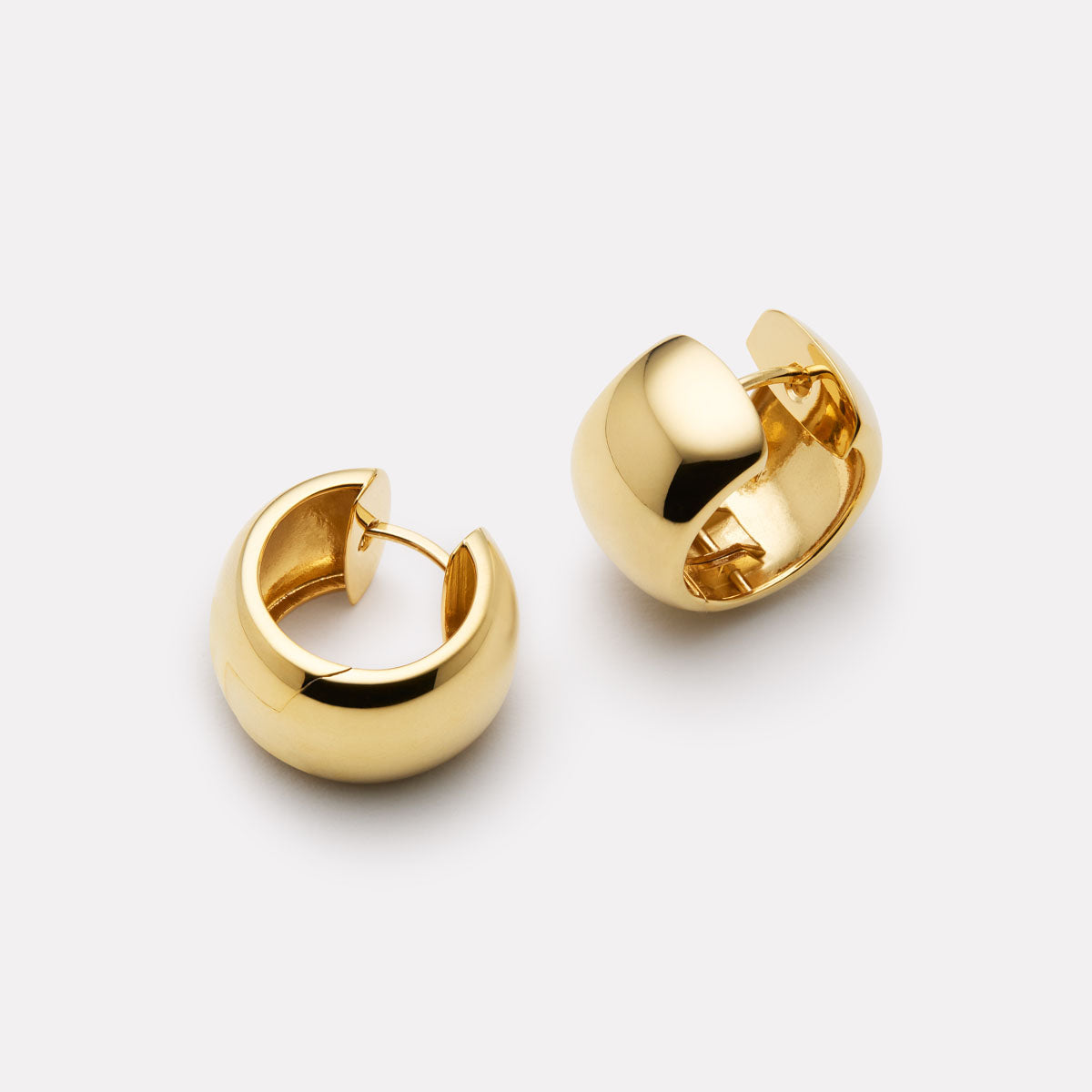 Yellow Gold Daynight Huggie Earrings