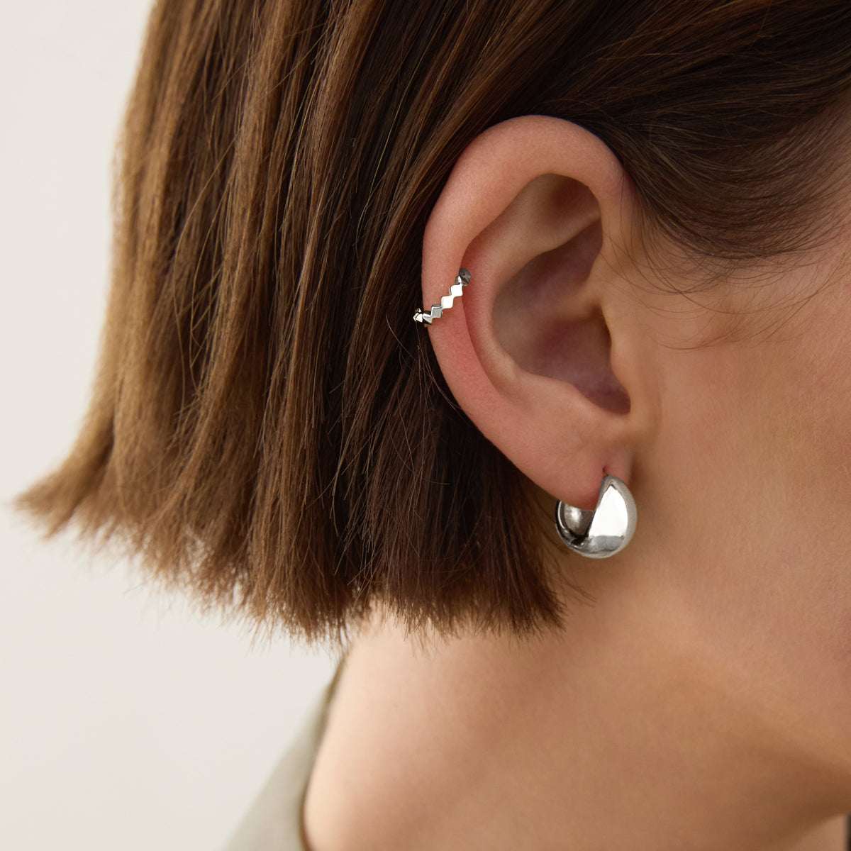 La Muse Huggie Earrings