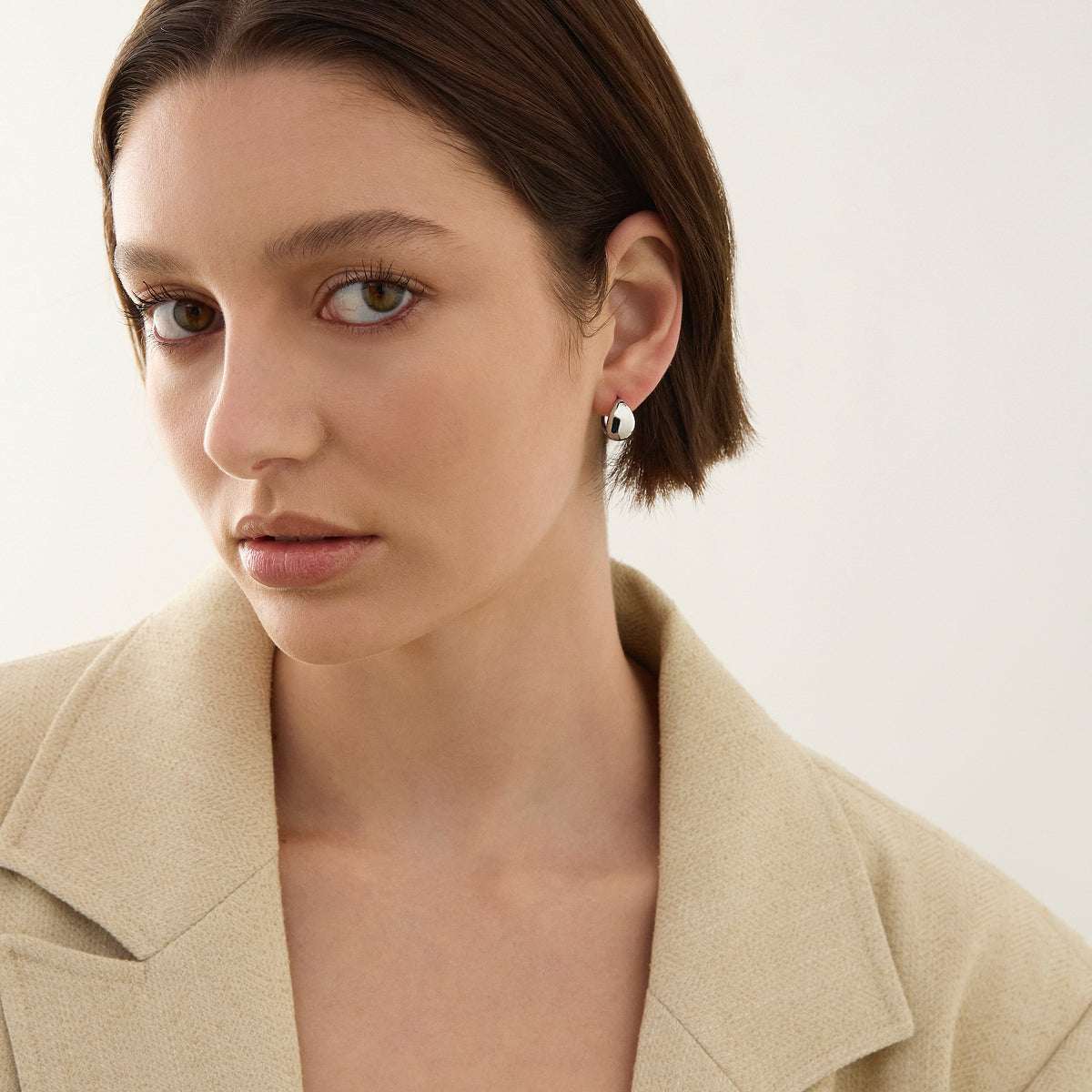 La Muse Huggie Earrings