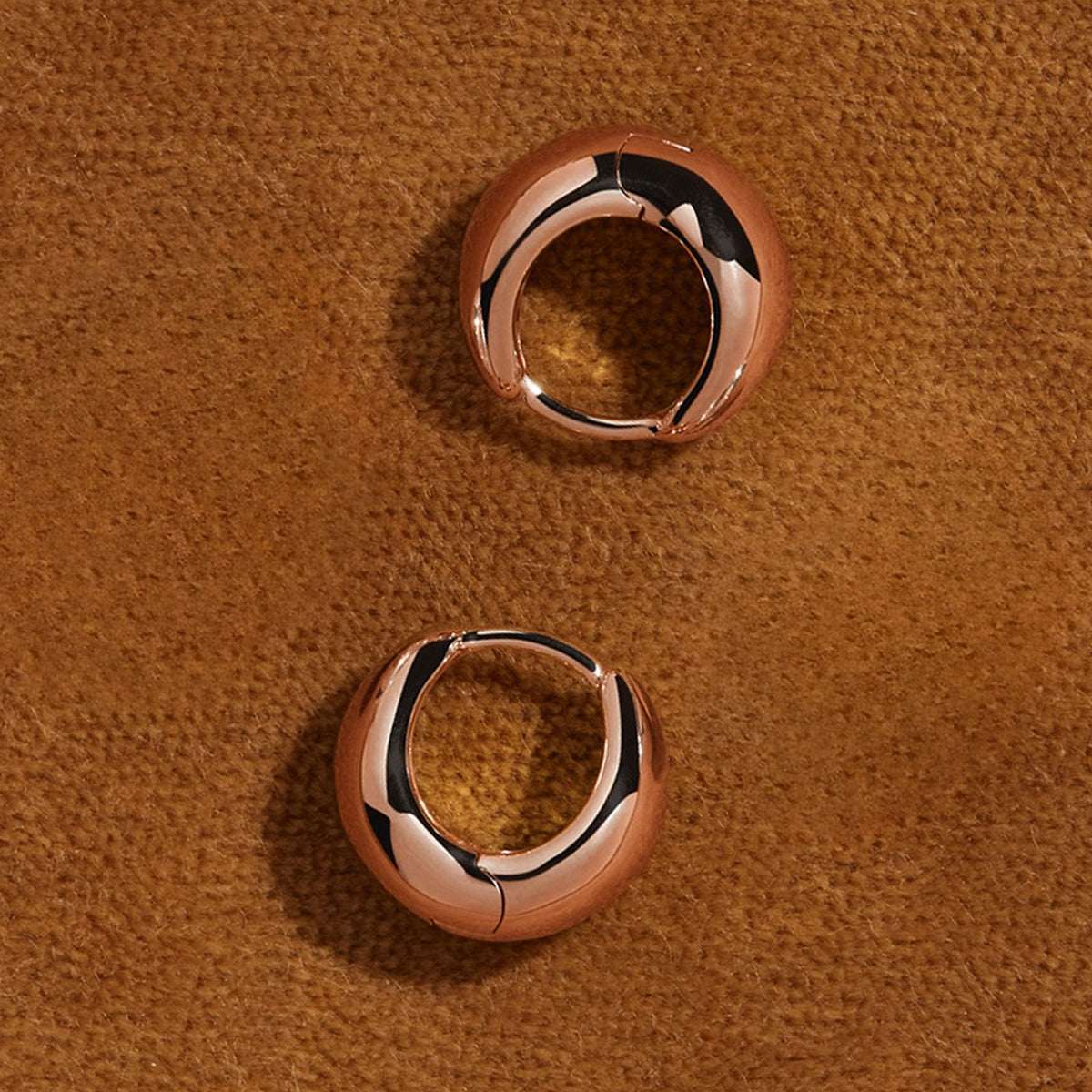La Muse Huggie Earrings